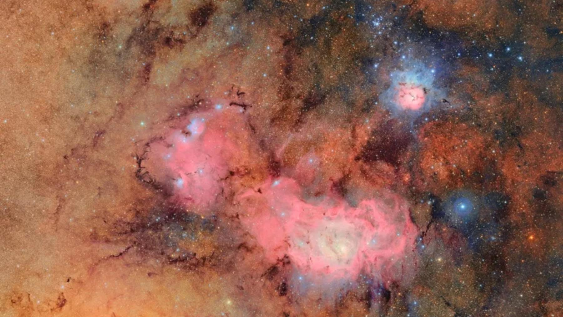 Fotografía cedida por el Observatorio Vera C. Rubin que muestra una imagen captada en su telescopio desde Chile, de Nebulosas Trífidas y Laguna en el espacio.